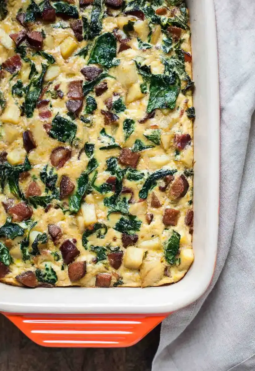 Paleo Breakfast Casserole with Bacon, Sausage, Sweet Potato, and Kale