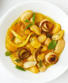 Bean Confit With Lemon, Saffron, and All the Alliums