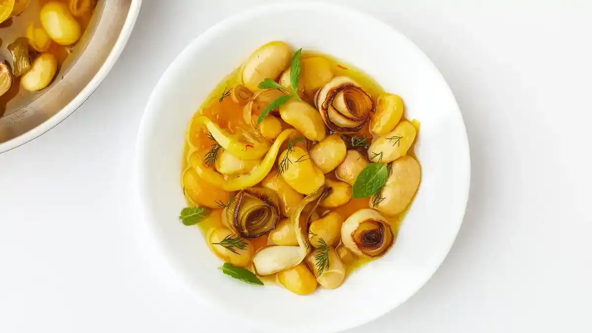 Bean Confit with Lemon, Saffron, and All the Alliums