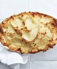 Fish Pie With Potatoes, Leeks, Zucchini, and Tomatoes