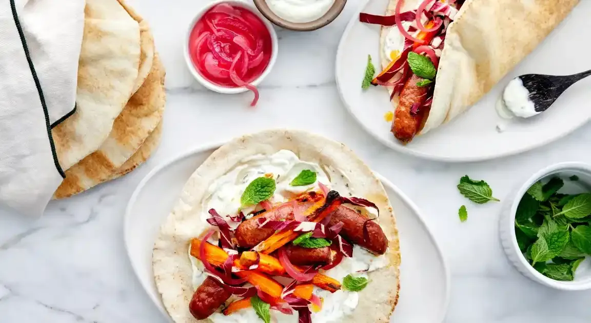 Sheet-Pan Merguez Sausages with Carrots & Yogurt