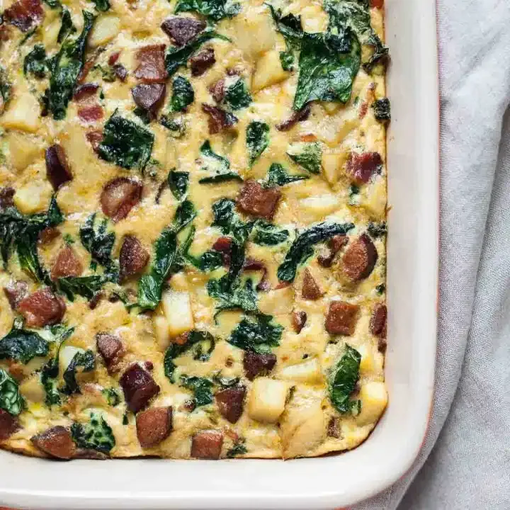 Paleo Breakfast Casserole with Bacon, Sausage, Sweet Potato, and Kale